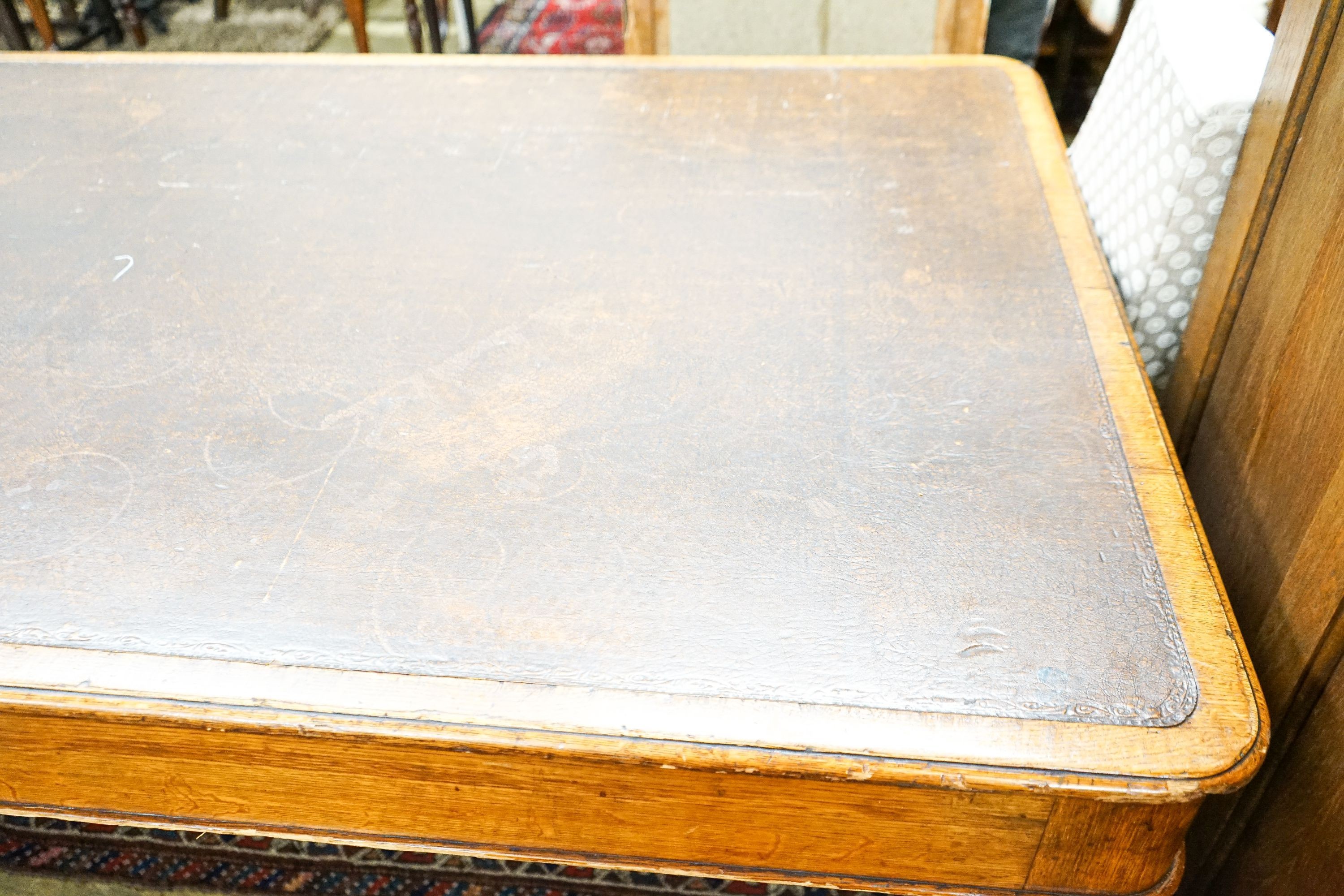 An early Victorian oak library table fitted two end drawers, from the Library of The Royal College of Surgeons, London, width 196cm, depth 105cm, height 76cm